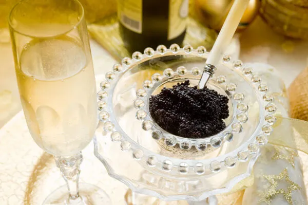 Caviar,And,Champagne,Over,Luxury,Table