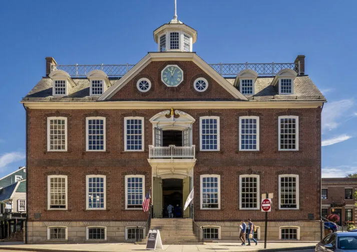 The historic red-brick Newport Colony House with its central clock tower